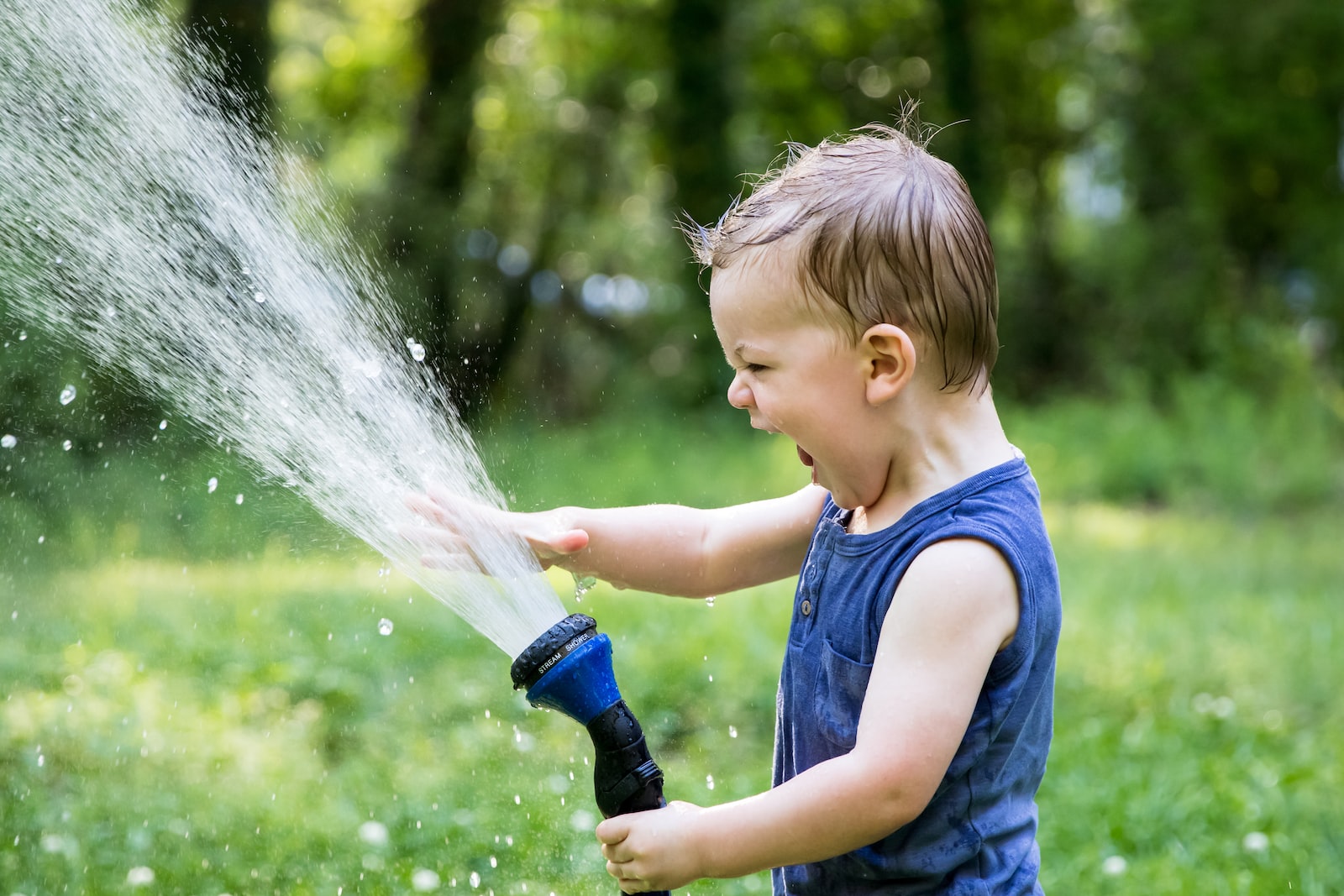 toddler playing water